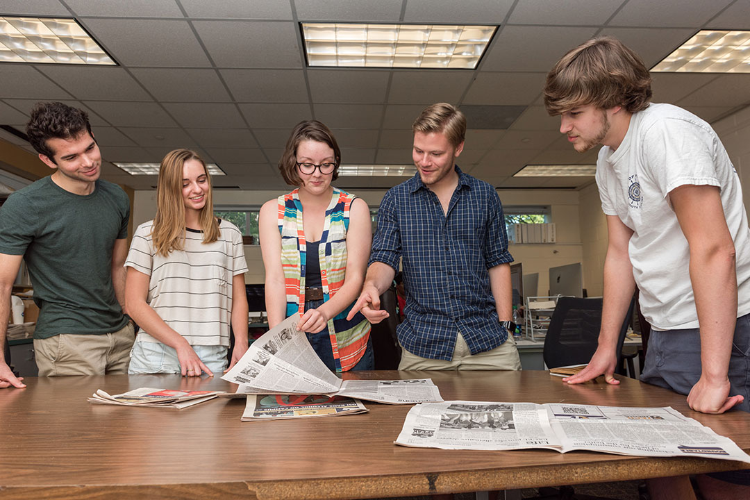 Some Technique staff members in their newsroom