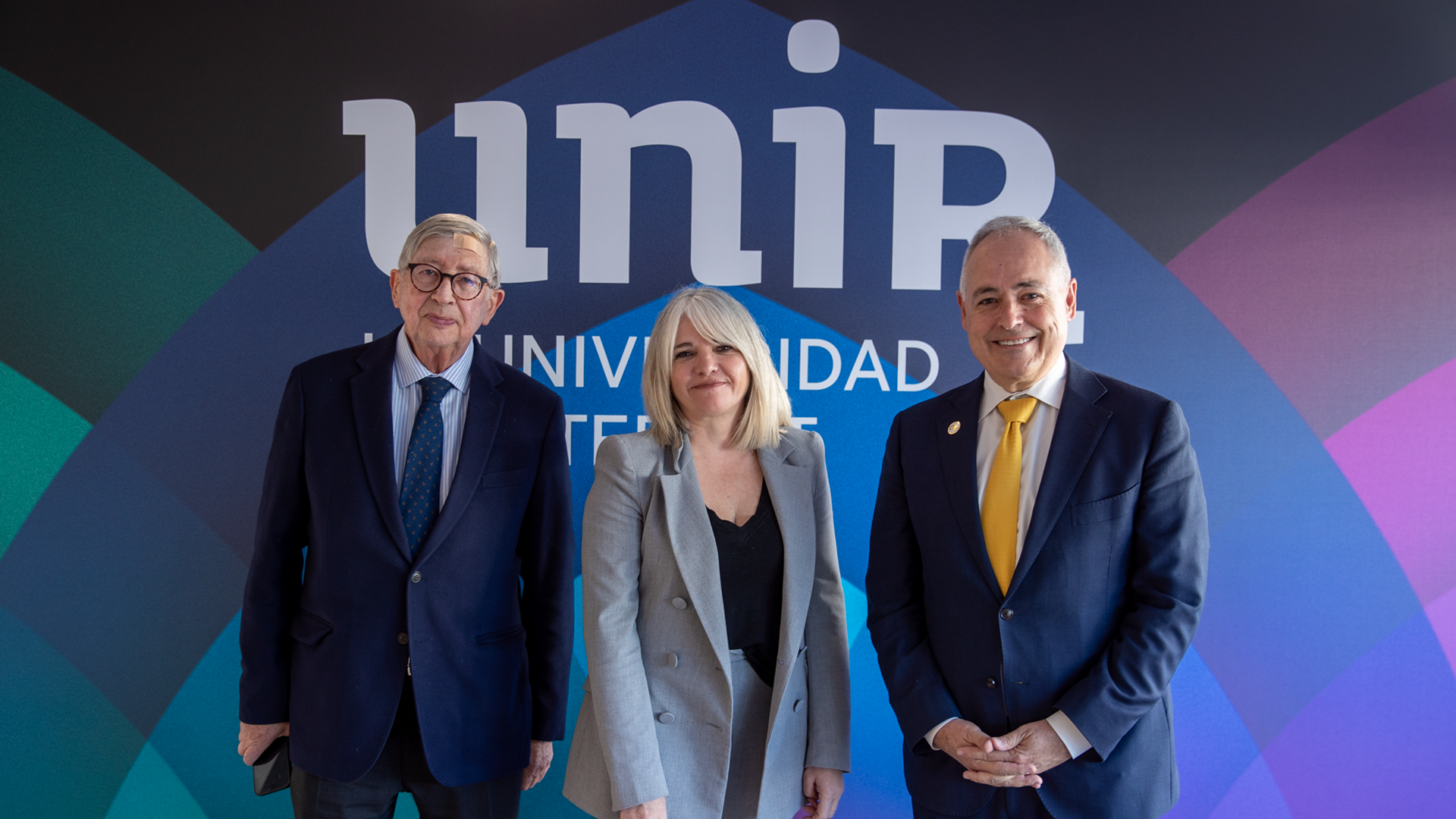 Jorge Heili, executive director of UNIR, and Eva Asensio, dean of the faculty of business and economics at UNIR, and Georgia Tech President Ángel Cabrera.